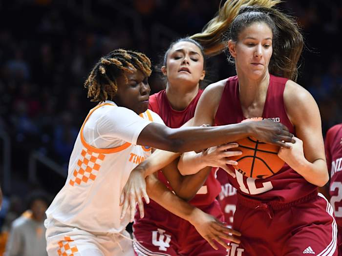 Indiana guard Yarden Garzon (12) and Tennessee forward Jillian Hollingshead (53) fight for the ball during the NCAA womens college basketball game on Monday, November 14, 2022 in Knoxville, Tenn.